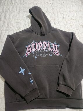 Supply NYC Black Graphic Hoodie with Pink & Blue Logo